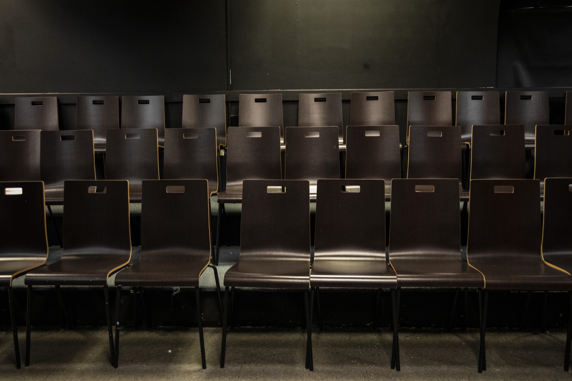 Angled view of Hudson School theater seating rows