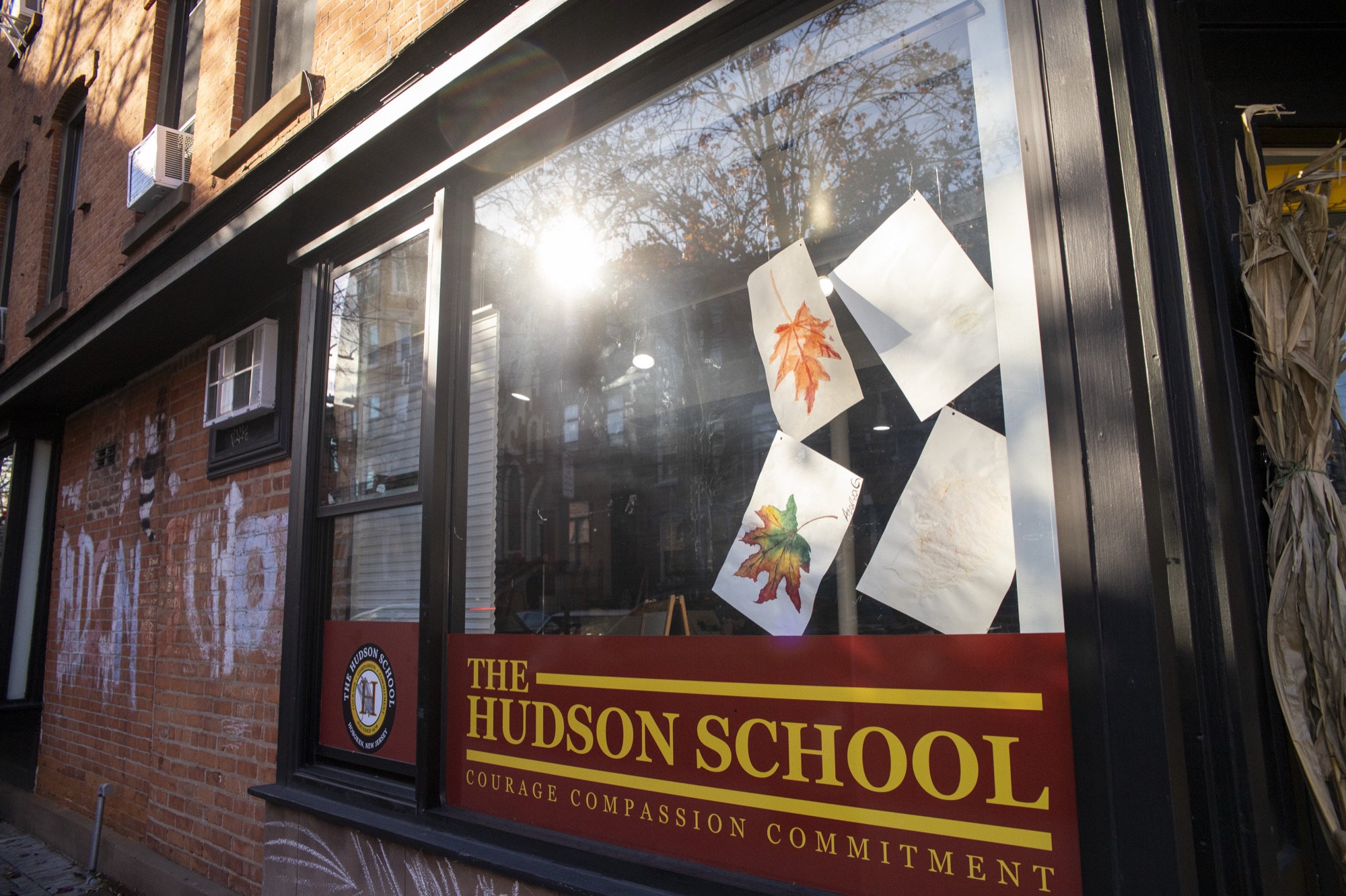 Hudson School name displayed on the brick building entrance in Hoboken