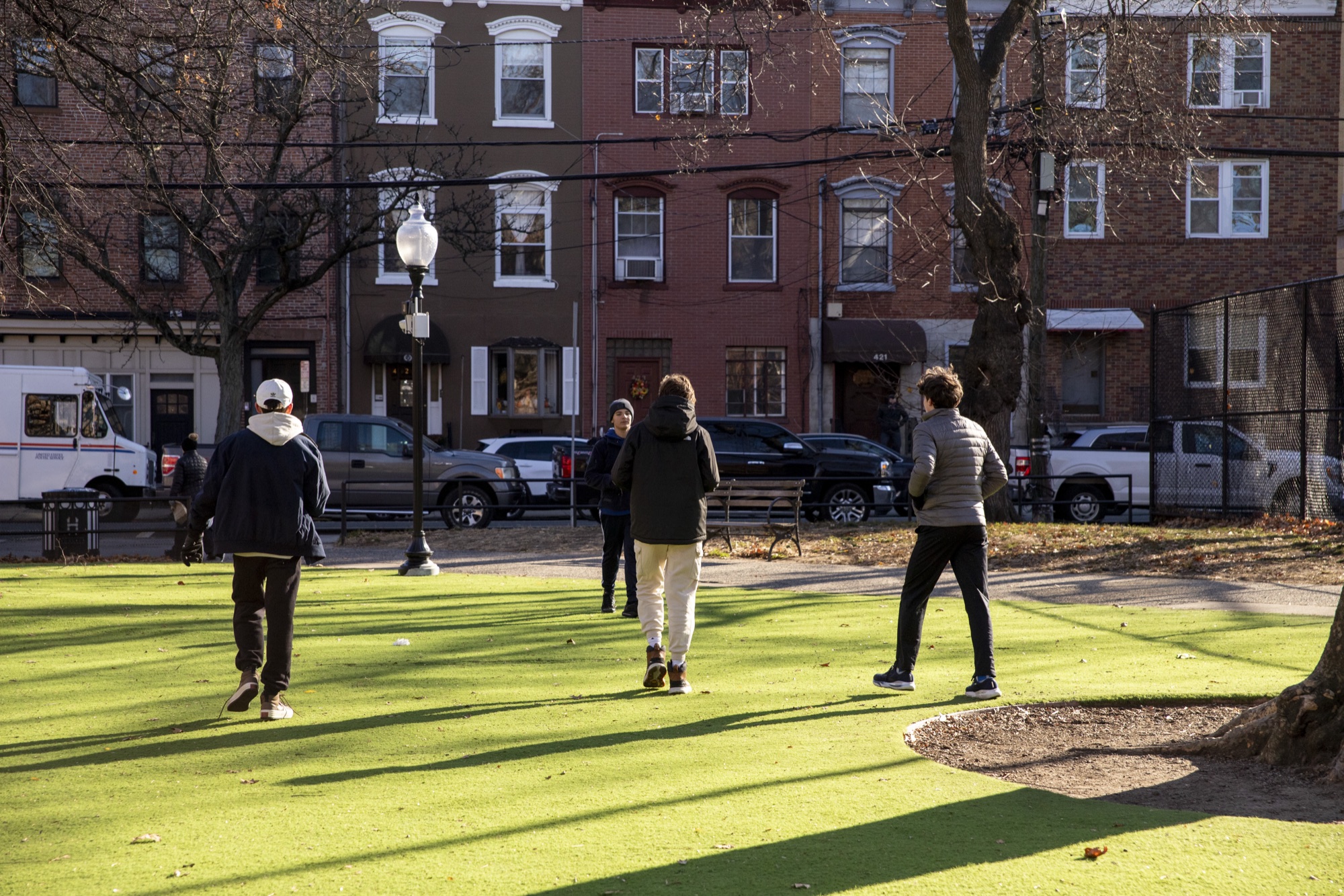 Two Hudson School upper school students competing outdoors in an athletic activity