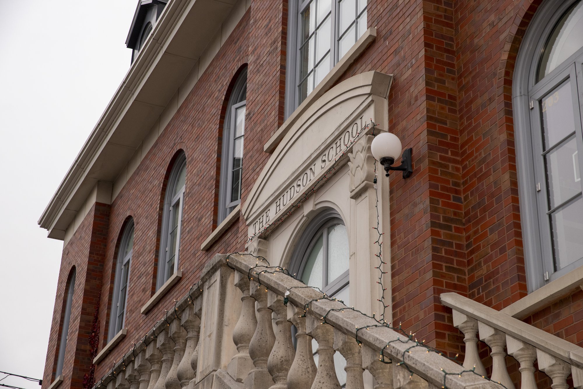 Hudson School brick building entrance close-up